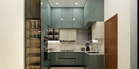 The kitchen repeats the sage in gloss, against pale stone.