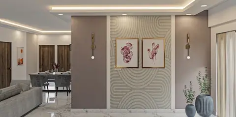 A textured wall panel with a pair of prints marks the dining end of the room.