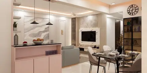 The breakfast counter turns the kitchen into the place people actually sit.
